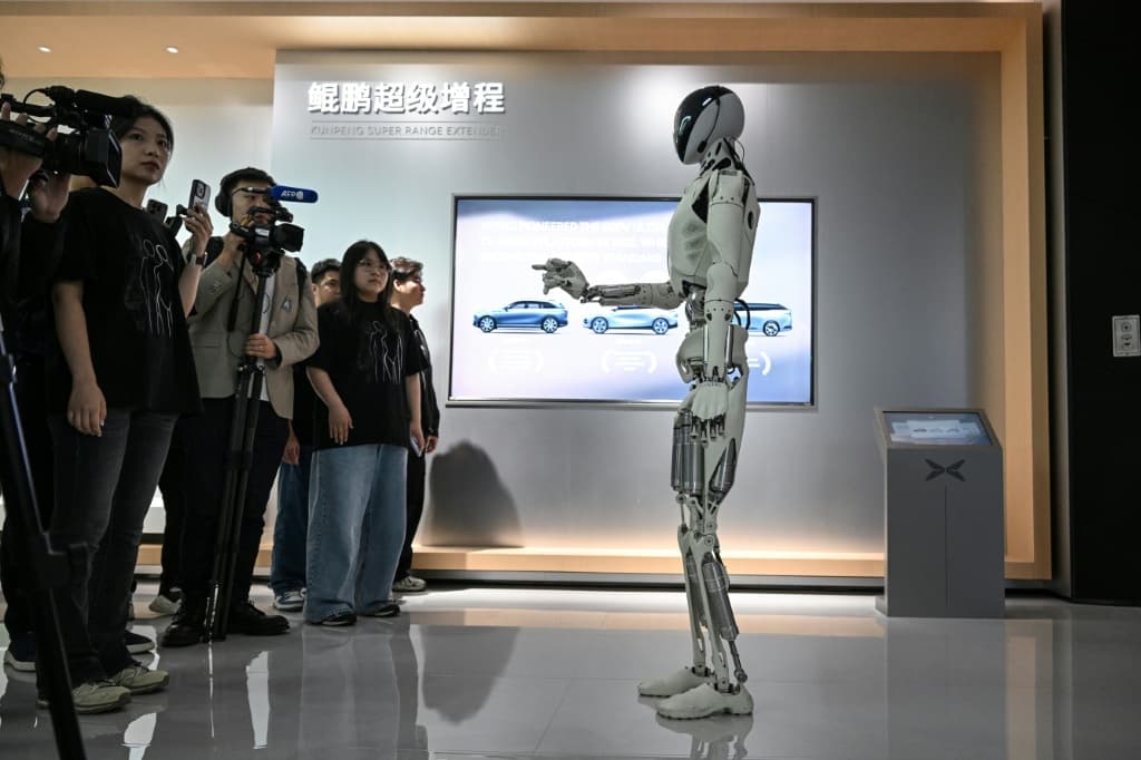 Xpeng's next-gen Iron humanoid robot speaks to media during a showroom tour at its headquarter in Guangzhou